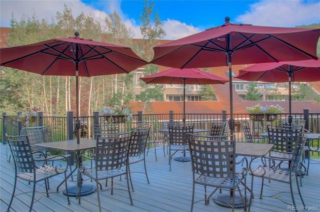 21650 US Highway 6 Unit 2096, Dillon, CO 80435 - wooden terrace with outdoor dining area