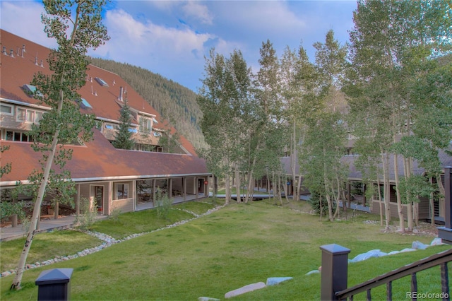 21650 US Highway 6 Unit 2096, Dillon, CO 80435 - view of home's community featuring a lawn