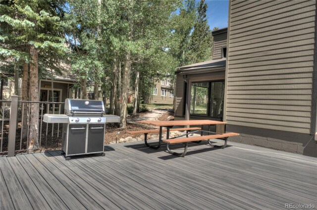 21650 US Highway 6 Unit 2096, Dillon, CO 80435 - wooden terrace featuring a grill