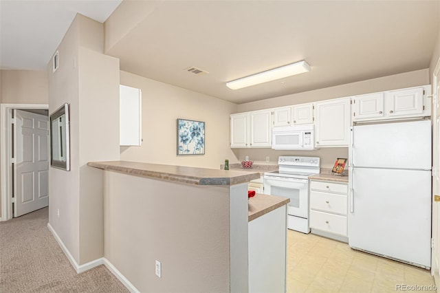 kitchen featuring white appliances, baseboards, visible vents, light countertops, and white cabinets