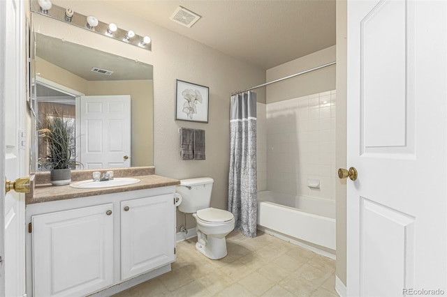 full bath with visible vents, shower / bath combination with curtain, toilet, and vanity