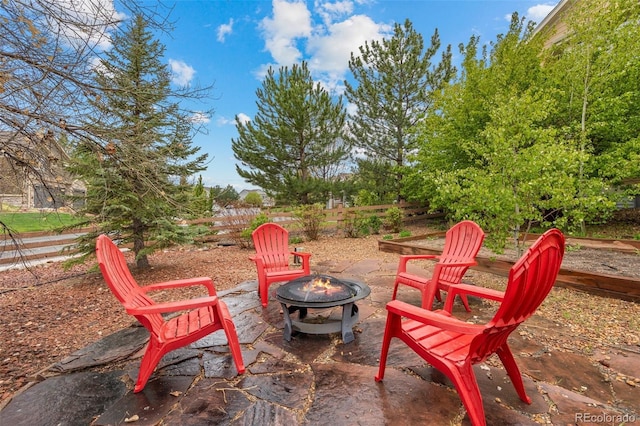 view of patio with an outdoor fire pit