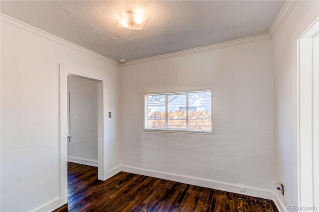 empty room featuring a textured ceiling, crown molding, and dark hardwood / wood-style floors