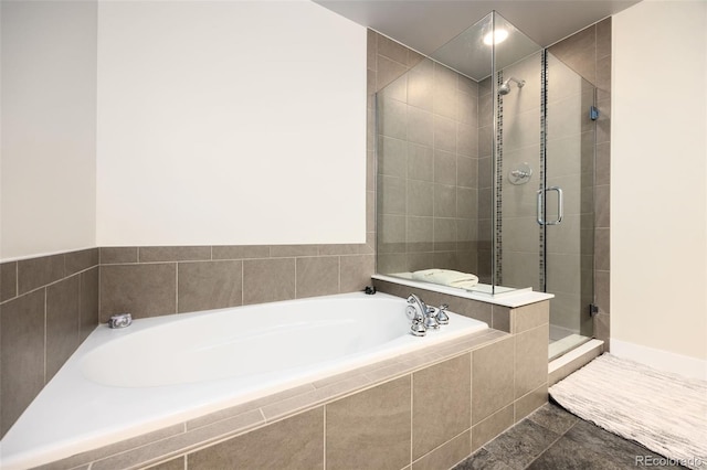 bathroom featuring tile patterned floors and plus walk in shower