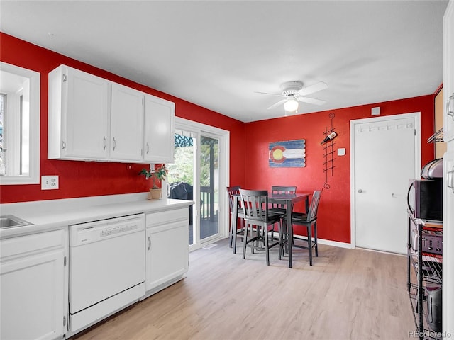 13133 Regulus Dr, Lone Tree, CO 80124 - kitchen featuring white dishwasher, ceiling fan, light wood-style flooring, white cabinetry, and light countertops