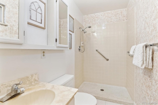 3298 Quail St, Wheat Ridge, CO 80033 - full bath with toilet, a tile shower, and vanity