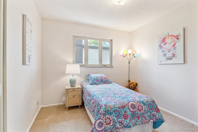 3298 Quail St, Wheat Ridge, CO 80033 - bedroom with carpet floors, baseboards, and a textured ceiling