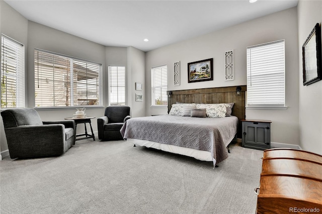 carpeted bedroom with baseboards and recessed lighting