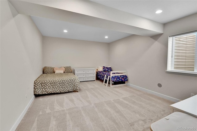 carpeted bedroom with baseboards and recessed lighting