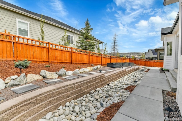 view of yard featuring a fenced backyard