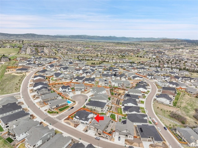 bird's eye view featuring a residential view and a mountain view