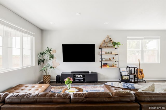 5099 S Robb St, Littleton, CO 80127 - living area featuring wood finished floors and baseboards