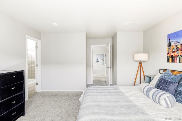 5099 S Robb St, Littleton, CO 80127 - bedroom featuring carpet flooring, baseboards, and ensuite bathroom