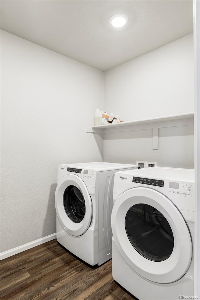 5099 S Robb St, Littleton, CO 80127 - washroom featuring washing machine and clothes dryer, dark wood-style flooring, and baseboards