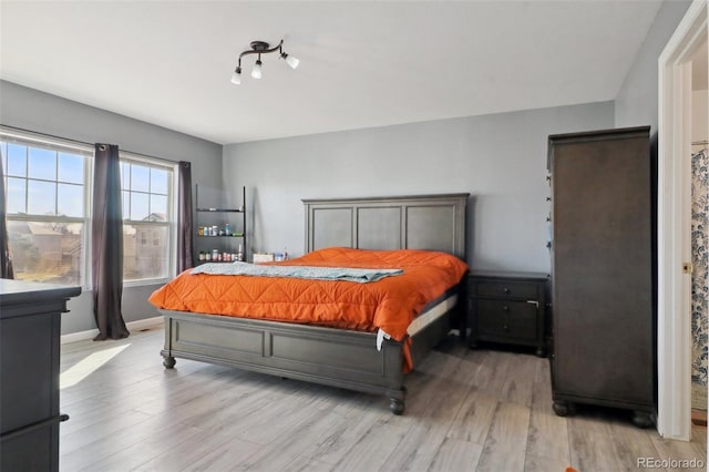 bedroom featuring light hardwood / wood-style flooring