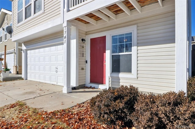 property entrance featuring a garage