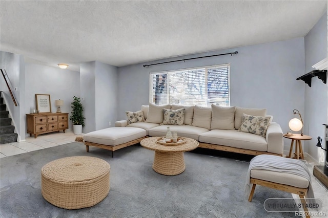 tiled living room with a textured ceiling