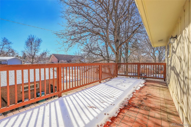 view of snow covered deck