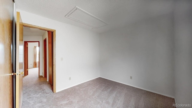 6796 S Independence St, Littleton, CO 80128 - carpeted empty room featuring attic access and baseboards