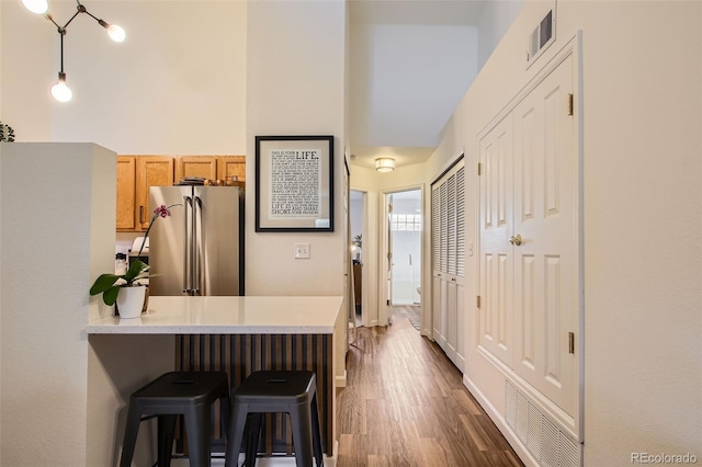 corridor with dark hardwood / wood-style flooring