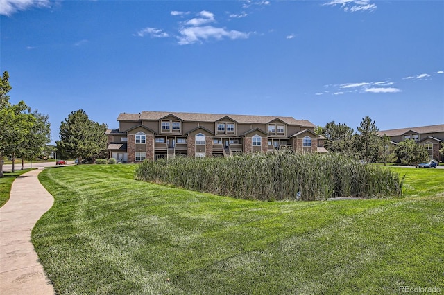 view of front of home with a front lawn