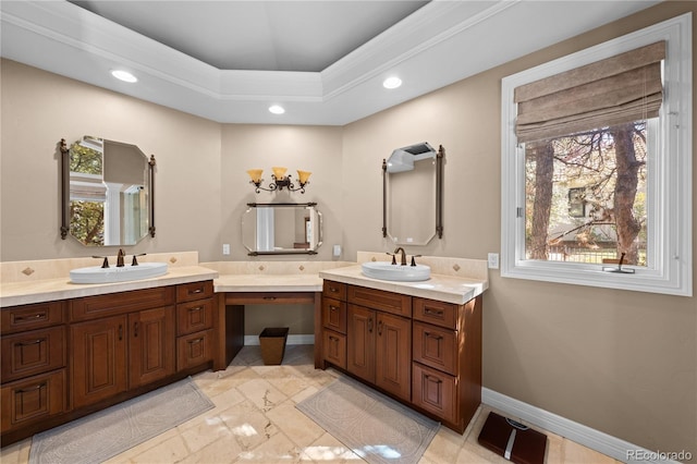 bathroom featuring vanity and a tray ceiling