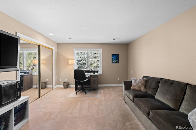 office area with light colored carpet