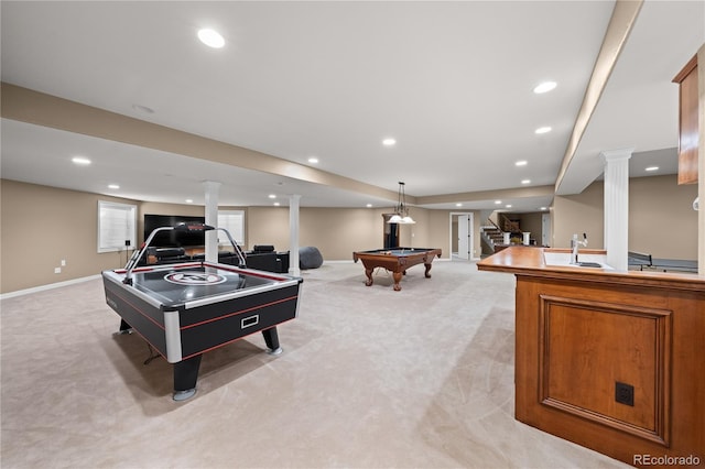 playroom featuring billiards, sink, light carpet, and ornate columns