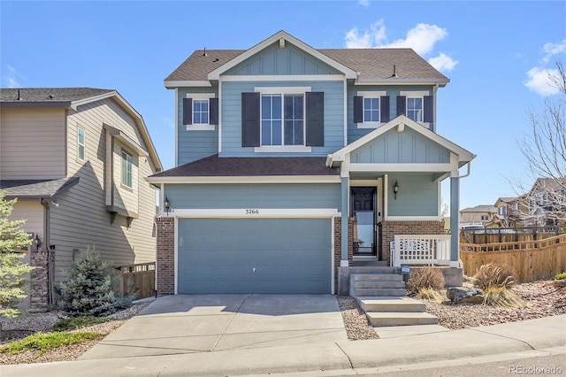 3266 Riverwood Way, Castle Rock, CO 80109 - craftsman inspired home with board and batten siding, fence, brick siding, a garage, and driveway