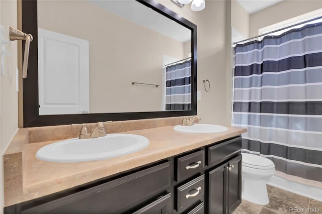3266 Riverwood Way, Castle Rock, CO 80109 - full bathroom with a sink, toilet, double vanity, and a shower with shower curtain