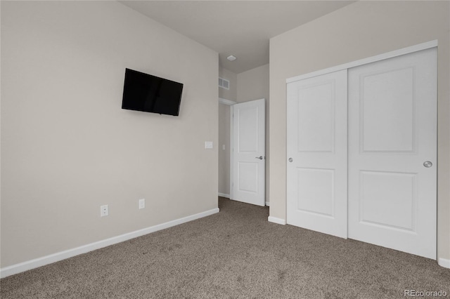 3266 Riverwood Way, Castle Rock, CO 80109 - unfurnished bedroom featuring a closet, carpet flooring, visible vents, and baseboards