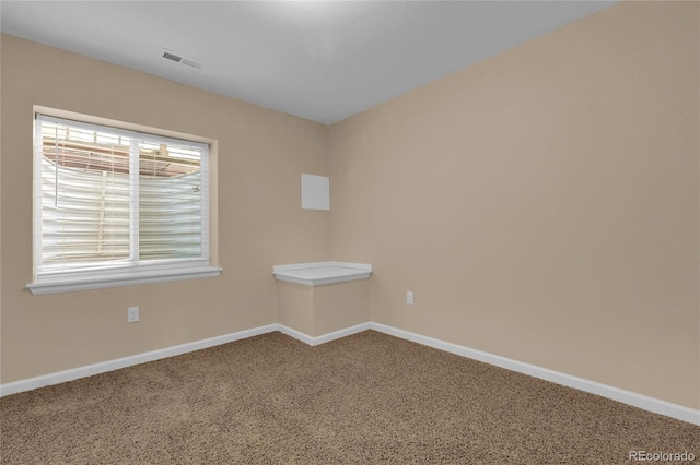 3266 Riverwood Way, Castle Rock, CO 80109 - spare room featuring carpet floors, baseboards, and visible vents