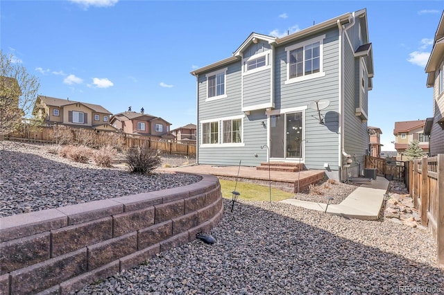 3266 Riverwood Way, Castle Rock, CO 80109 - back of property with a residential view, a patio, entry steps, and a fenced backyard