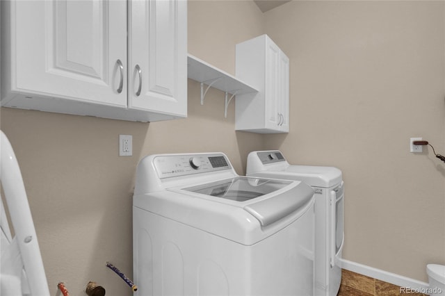 3266 Riverwood Way, Castle Rock, CO 80109 - laundry area with cabinet space, washing machine and clothes dryer, and baseboards