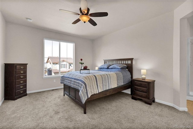 3266 Riverwood Way, Castle Rock, CO 80109 - bedroom featuring baseboards, ceiling fan, and light carpet