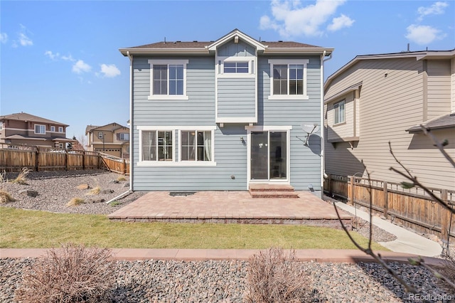 3266 Riverwood Way, Castle Rock, CO 80109 - rear view of property with a fenced backyard and a patio