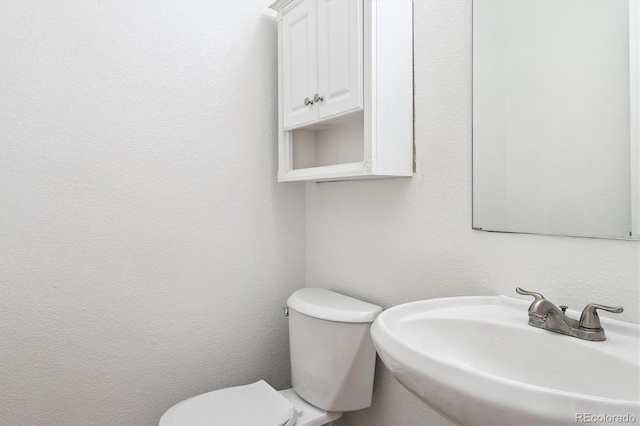 9905 Aftonwood St, Highlands Ranch, CO 80126 - bathroom with a sink and toilet
