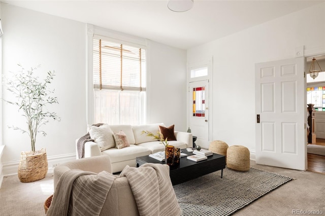 living room with light colored carpet