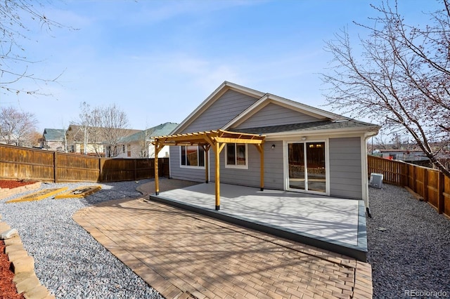 16351 E 104th Pl, Commerce City, CO 80022 - rear view of house featuring a pergola, a fenced backyard, and a patio