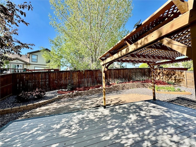 16351 E 104th Pl, Commerce City, CO 80022 - wooden terrace with a pergola and a fenced backyard