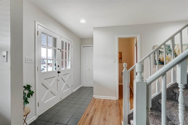 doorway with dark wood-type flooring