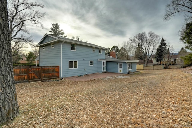 rear view of property with a patio