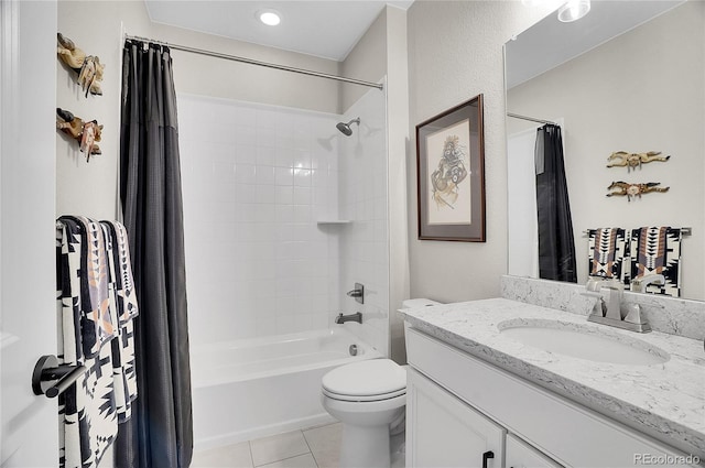 bathroom with toilet, shower / tub combo with curtain, vanity, and tile patterned flooring