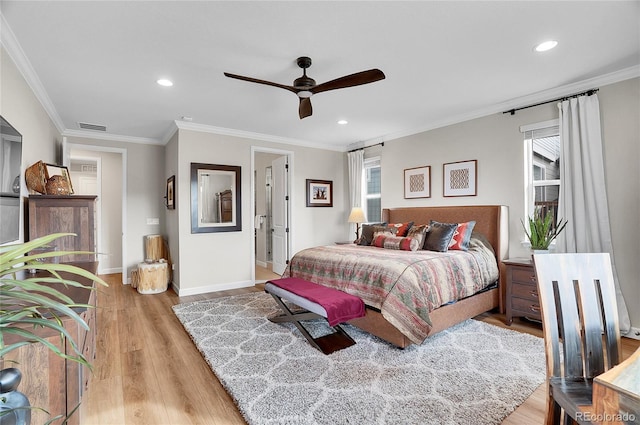 bedroom with visible vents, baseboards, ornamental molding, recessed lighting, and light wood-style flooring