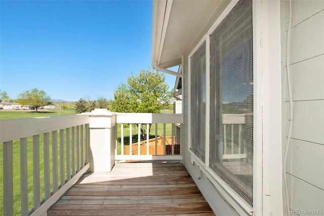 wooden balcony with a deck