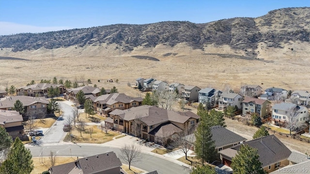 birds eye view of property featuring a residential view and a mountain view