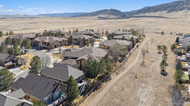 bird's eye view with a residential view and a mountain view