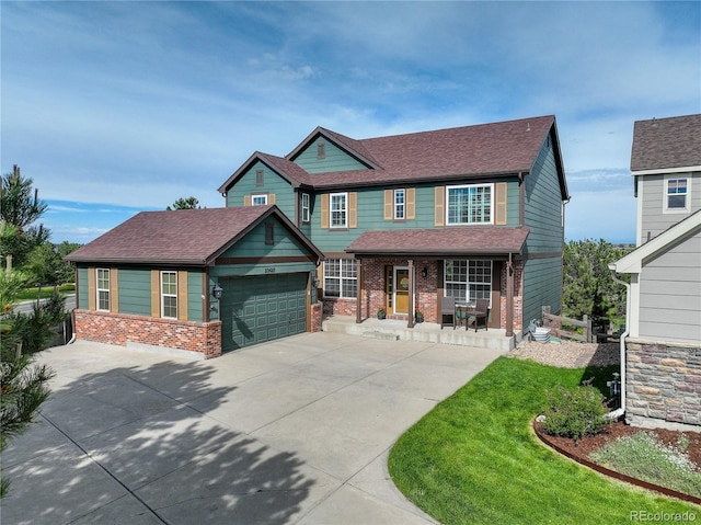 23427 Song Bird Hills Pl, Parker, CO 80138 - craftsman-style house featuring brick siding, covered porch, driveway, a garage, and a shingled roof