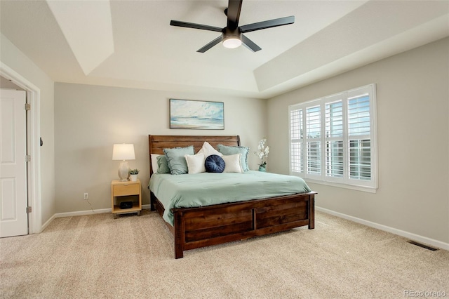 23427 Song Bird Hills Pl, Parker, CO 80138 - bedroom with a raised ceiling, light carpet, baseboards, and a ceiling fan