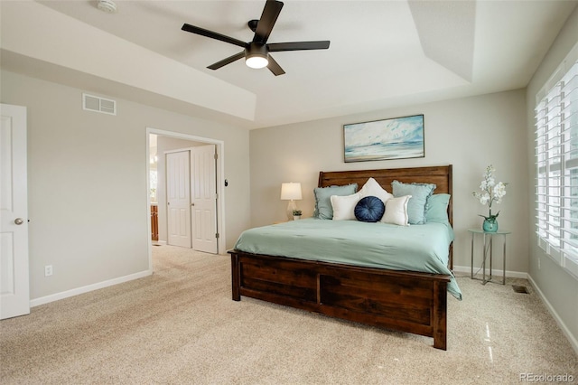 23427 Song Bird Hills Pl, Parker, CO 80138 - carpeted bedroom with a raised ceiling, ceiling fan, and baseboards
